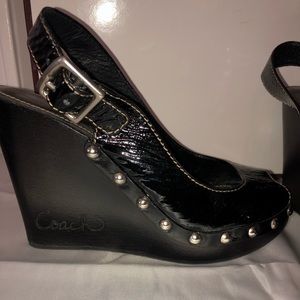 Black patent leather COACH wedge